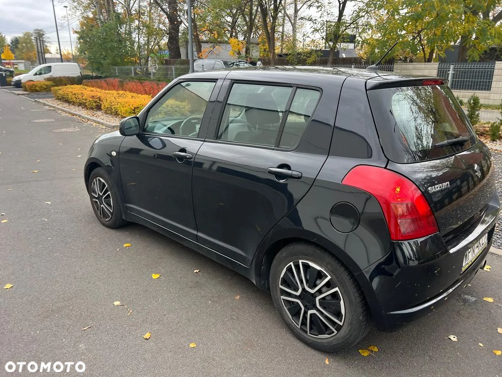 Suzuki Swift 1.3 Club - 12