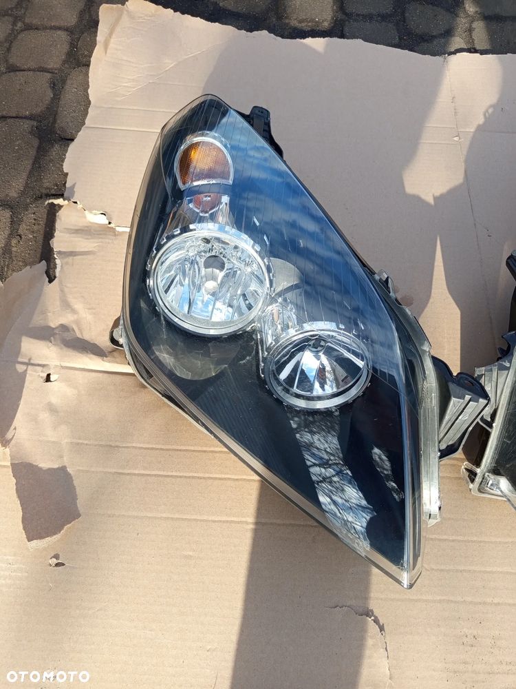REFLEKTOR LEWY LUB PRAWY OPEL ASTRA H III 3 03-07 - 2