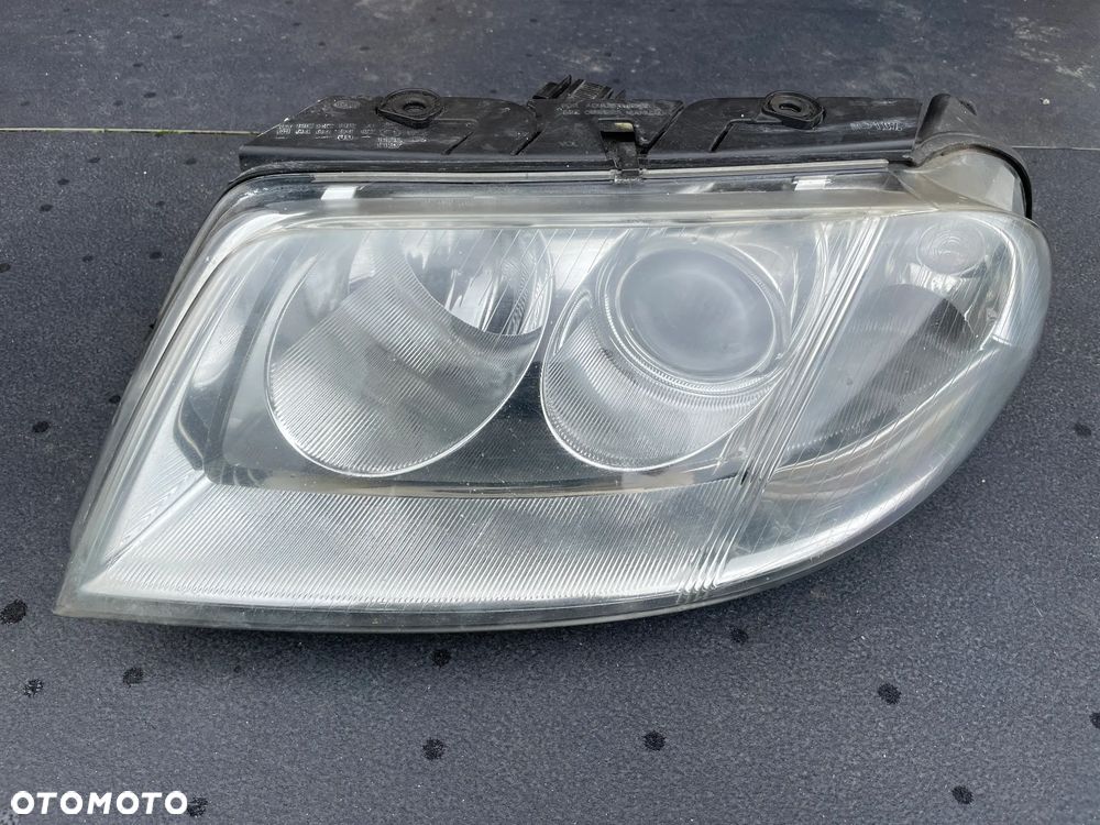 VW Passat B5 LIFT Reflektor Lampa lewy lewa PRZÓD HELLA