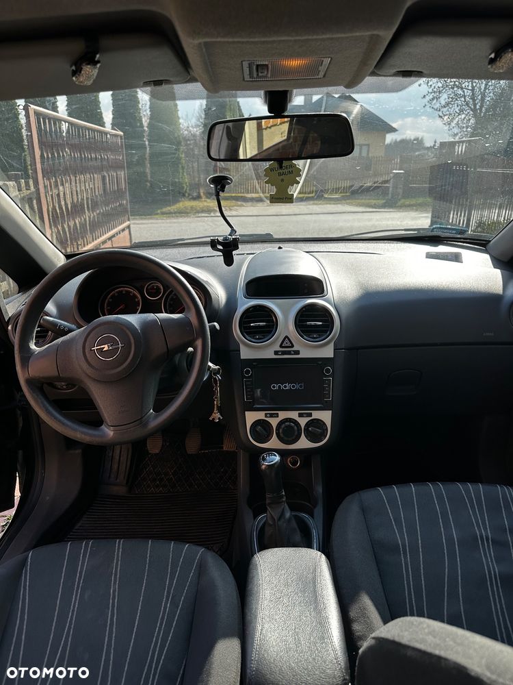 Opel Corsa 1.4 16V Cosmo - 11