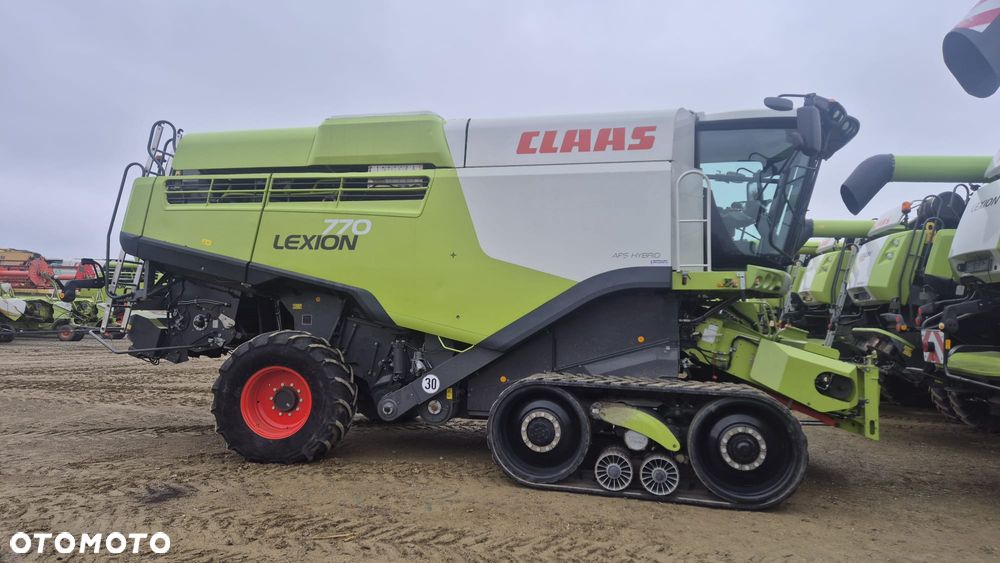 Claas Lexion 770TT z hederem - 3