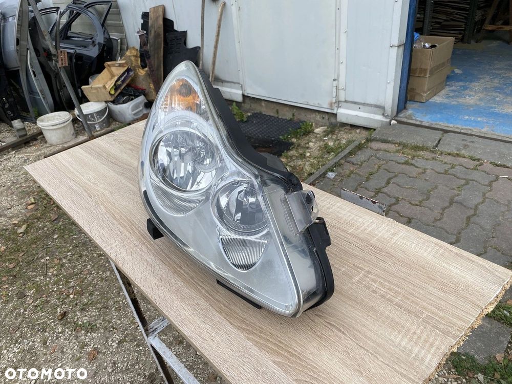 LAMPA PRZEDNIA LEWA OPEL CORSA D 06-11 EUROPA 13186382 - 3