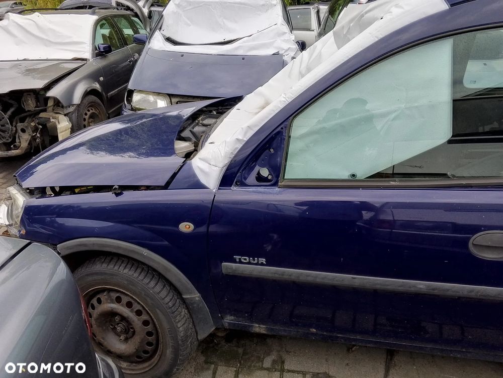 Opel Combo C (03-11r.) 1.3D 69KM. Silnik Y13DT Skrzynia M26 lakier 4DU. Cały na części GWARANCJA!!!!  Przód Tył Zestaw Komplet Drzwi Klapa Zderzak Błotnik Maska Grill Atrapa Szyba Pas Lampa Lusterko Boczki Fotel Kanapa Kokpit Deska Rozdzielcza Przełącznik Włącznik Sterownik Przewody Wiązka Instalacja Moduł Komputer Czujnik Listwa Pompa Alternator Wtryski Głowica Rozrusznik Kompresor Sprzęgło Dwumas Silnik Skrzynia ABS Klimatyzacji Paliwa Wspomagania Kolektor Turbina Przepustnica Zawór Chłodnica Koło Hak Belka Sanki Zawieszenie Mcpherson Półoś Amortyzator Wydech Tłumik Zacisk Most - 5