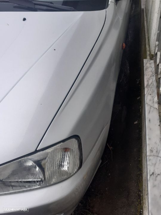 Guarda lamas hyundai accent ano 2002 - 2