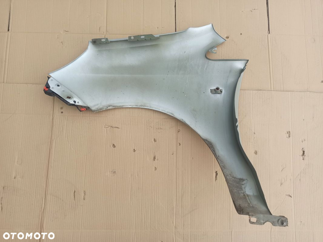 Błotnik prawy przód OPEL CORSA D Z157 06-11 - 10