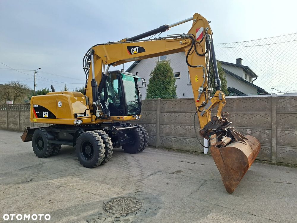 Caterpillar CAT M 313 D - 12