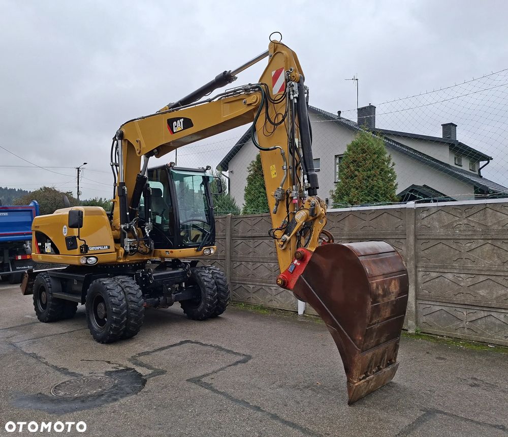 Caterpillar CAT M 313 D - 12