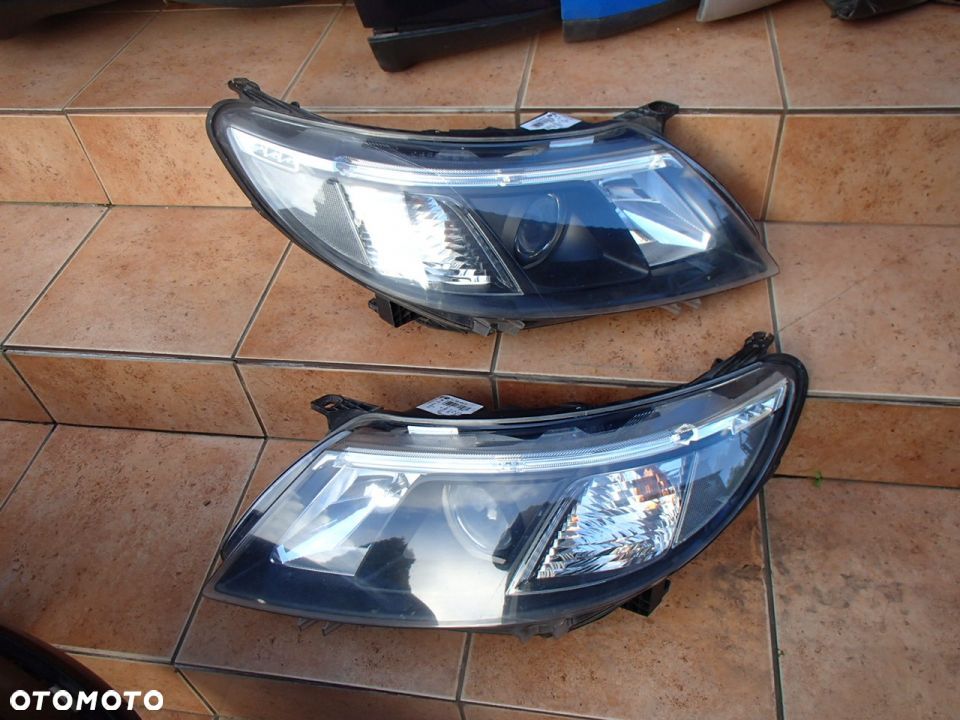 SAAB 93 9-3 LIFT 07->LAMPA PRAWA HELLA LED - 1