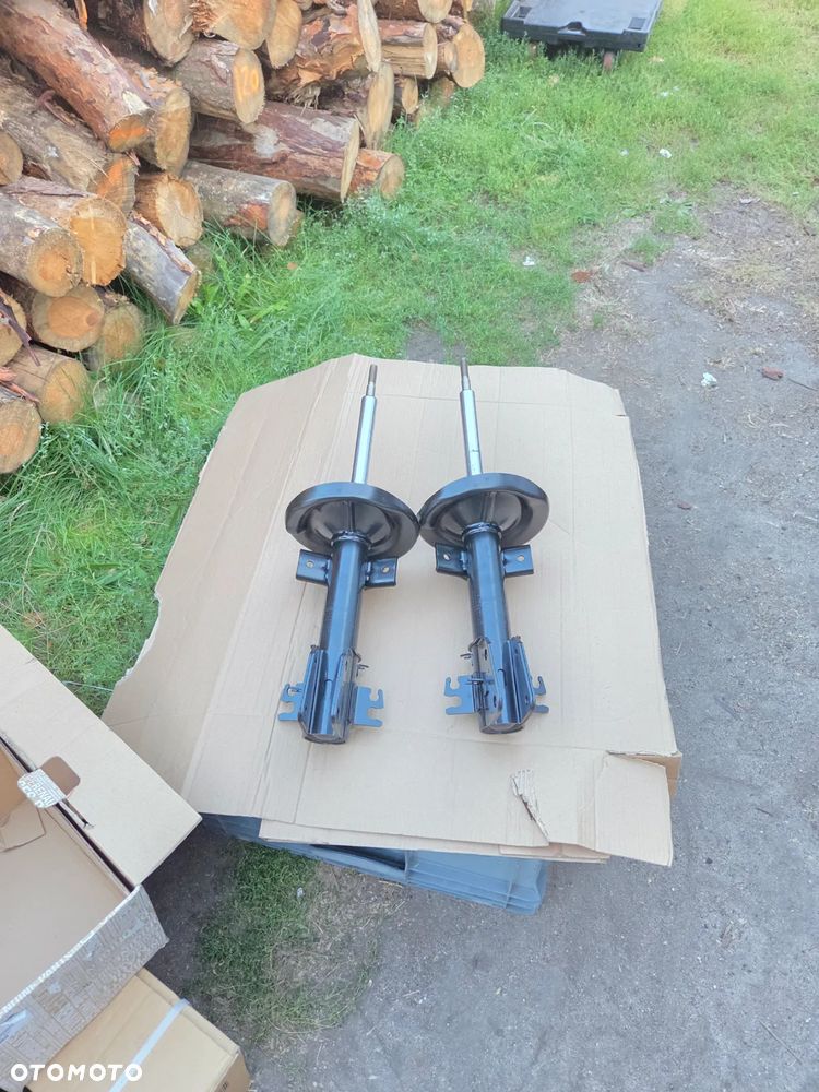 Amortyzatory amortyzator przód przedni Renault Master III Opel Movano B Nissan NV400 95508206 543029774R - 2