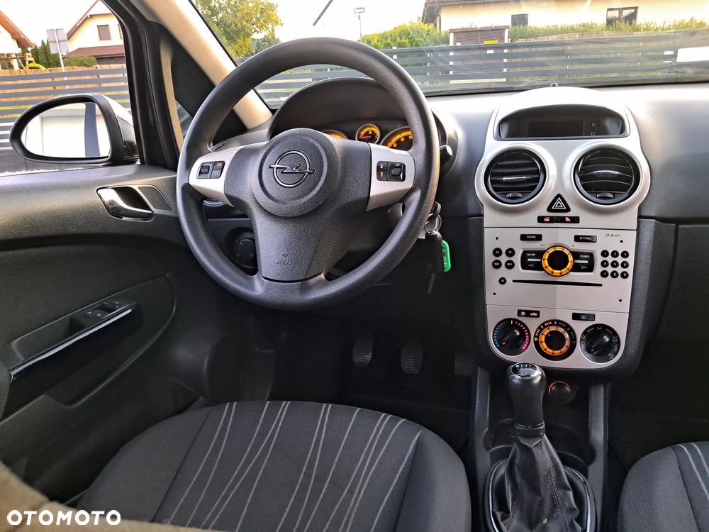 Opel Corsa 1.2 16V Enjoy - 23