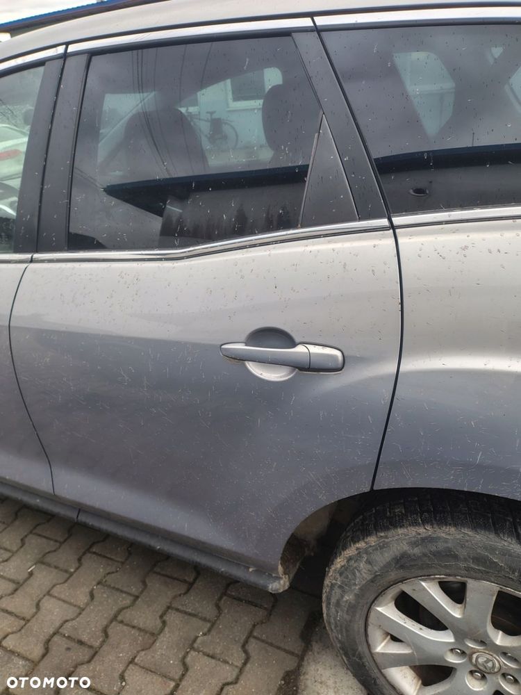 MAZDA CX7 DRZWI LEWE TYŁ TYLNE GOŁE - 1