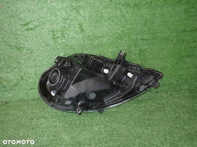 TRAFIC VIVARO II LIFT 06-14 reflektor lewy lampa lewa 8200701352 - 2