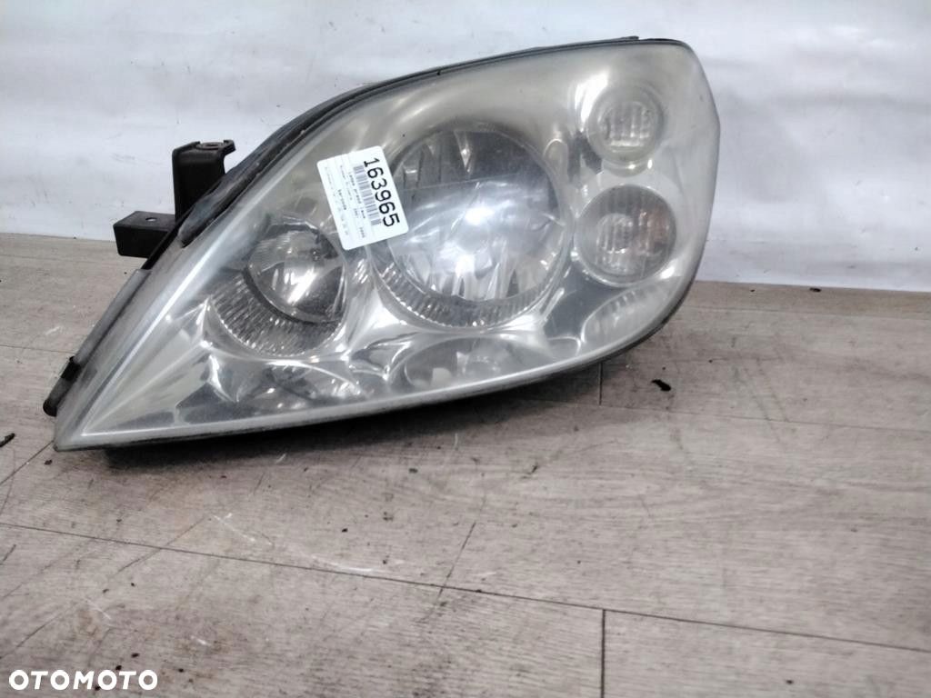 NISSAN PRIMERA P12 XENON LAMPA PRZÓD LEWA - 1