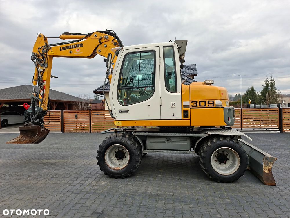 Liebherr A309 ROTOTILT - 1