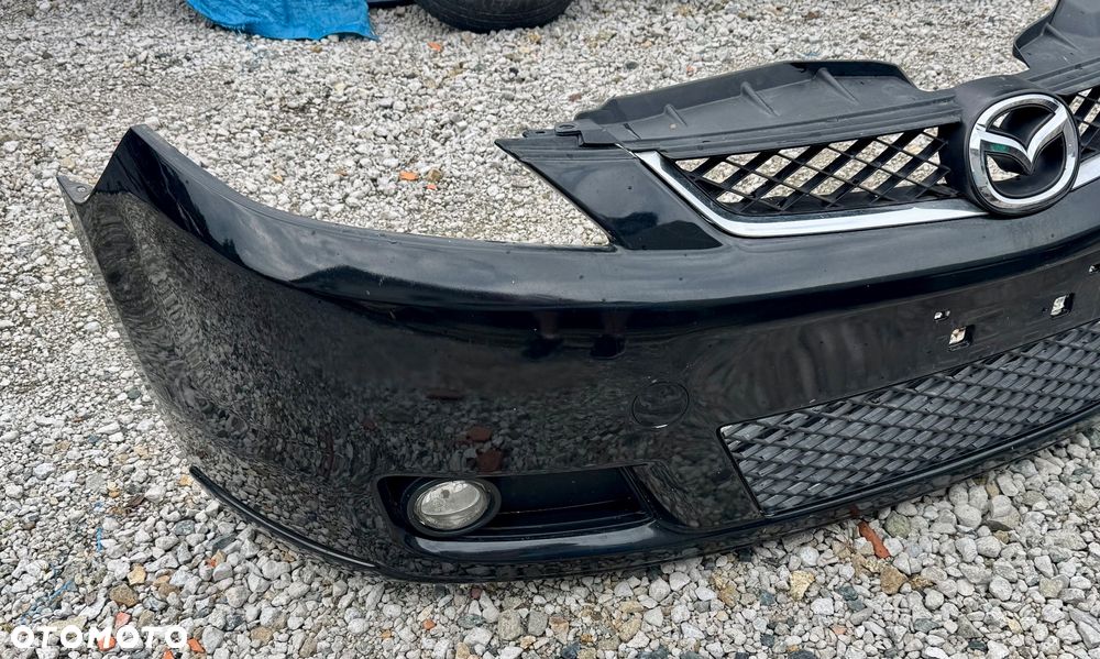 Mazda 5 CR 2005/2007 i 2008/2010r zderzak przedni tylny maska błotnik wzmocnienie belka chłodnice stan b.dobry Europa zwykle i xenon ksenon gołe i kompletne !!! Posiadam również zbiorniczki spryskiwaczy  spryskiwacze lamp  halogeny kratki  Grill i dużo innych Czesci do mazdy 5 CR !!! - 5