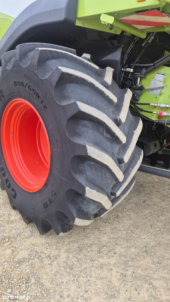 Claas Lexion 750 z hederem - 11