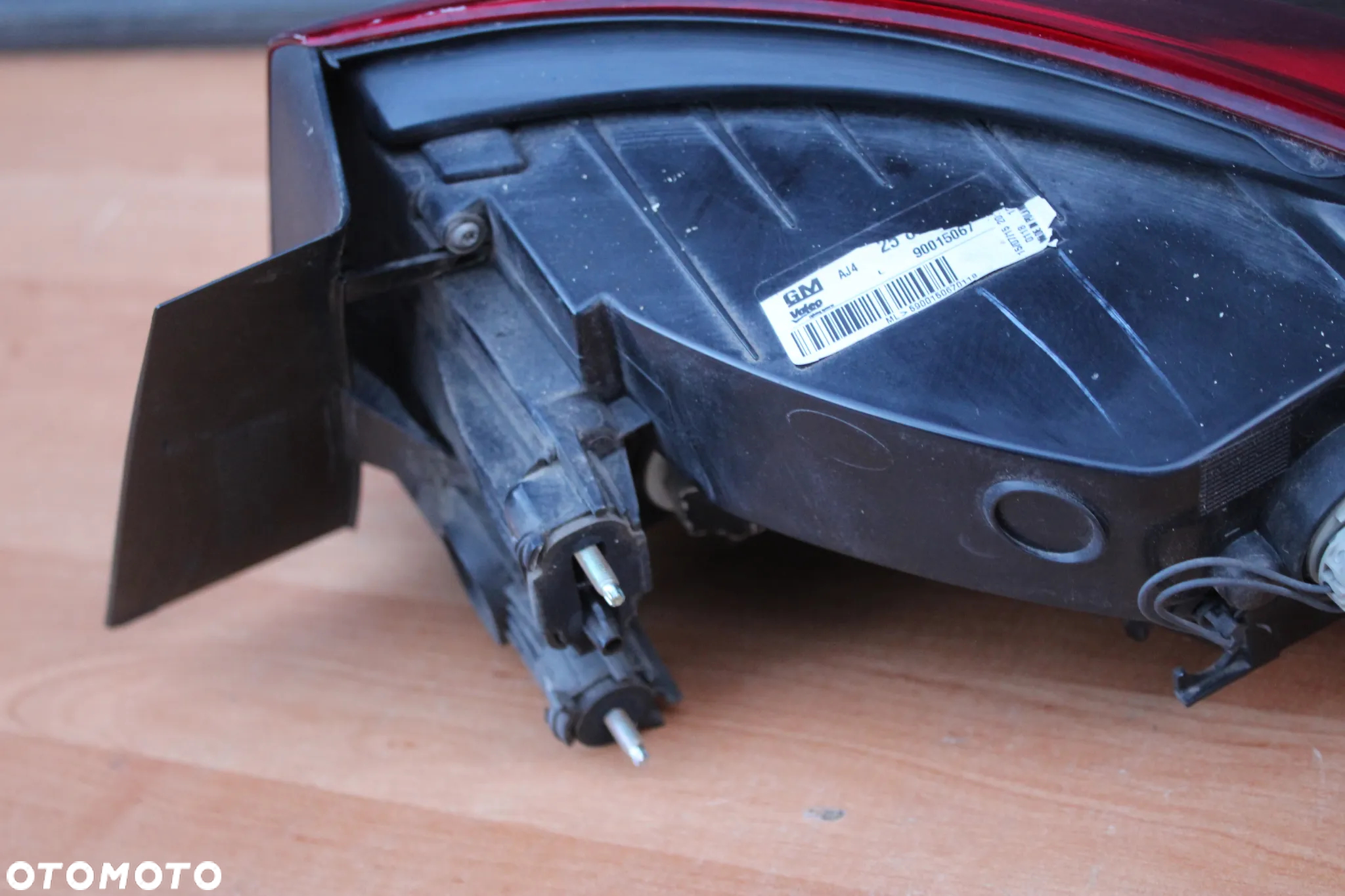 LAMPA LEWA TYLNA LEWY TYŁ W BŁOTNIK OPEL ASTRA J SEDAN EUROPA ORYGINALNA 25870153 - 9
