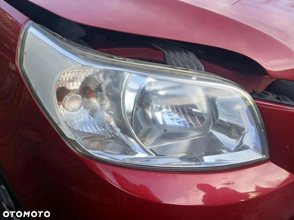 Chevrolet Aveo T250 2009 rok Lampa przednia lewa, prawa. - 1