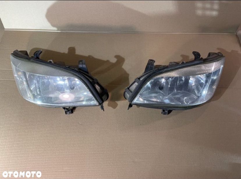 Lampa reflektor przód lewa prawa opel zafira a 89100055 , 89100054 - 1