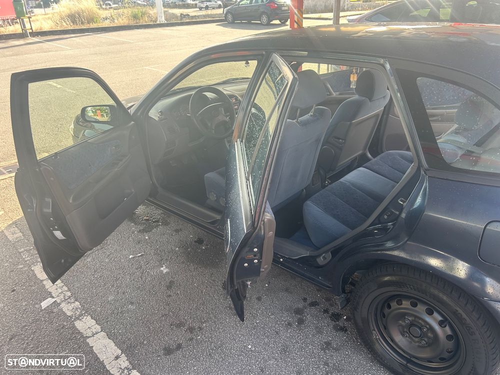Mazda 323 1.3 - 10