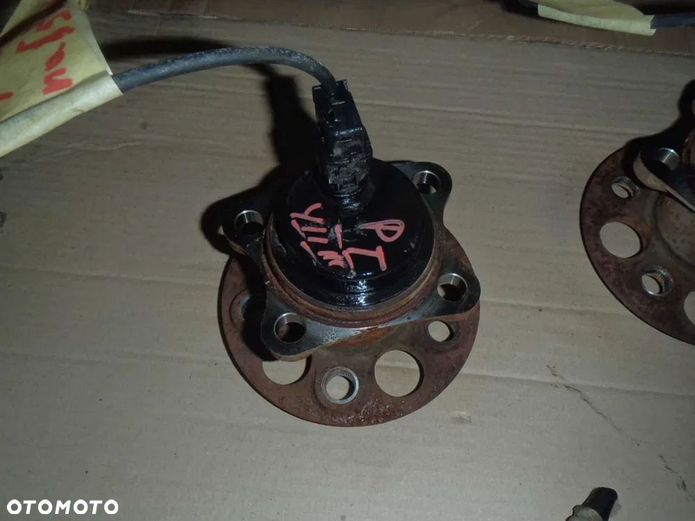 piasta łożysko abs tył toyota yaris I 1 II III wersja pod tarcze jak nowe - 7