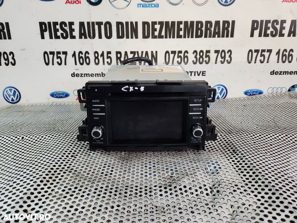 Unitate Radio Cd Navigatie Originala Mazda CX5 CX-5 An 2013-2014-2015-2016-2017 Testata Cu Garantie Dezmembrez Mazda CX5 2.2 Diesel Skyactive 4x4 An 2013-2014-2015-2016-2017 - Dezmembrari Arad - 2