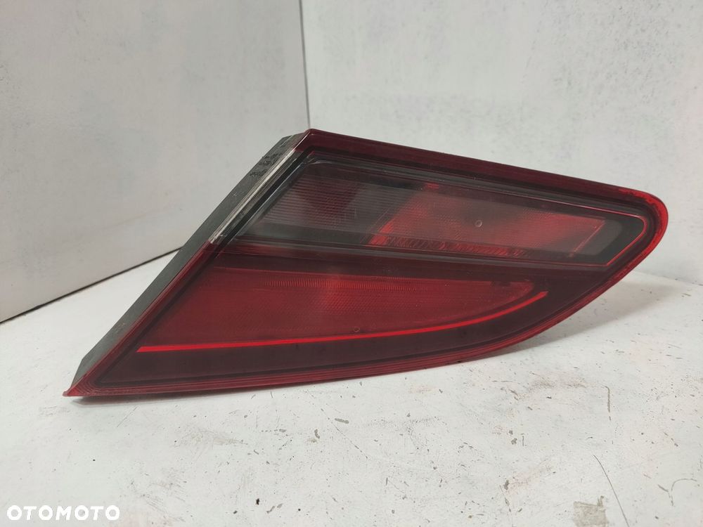 lampa tylna w klape lewa astra j 4 iv gtc 13399955 - 2