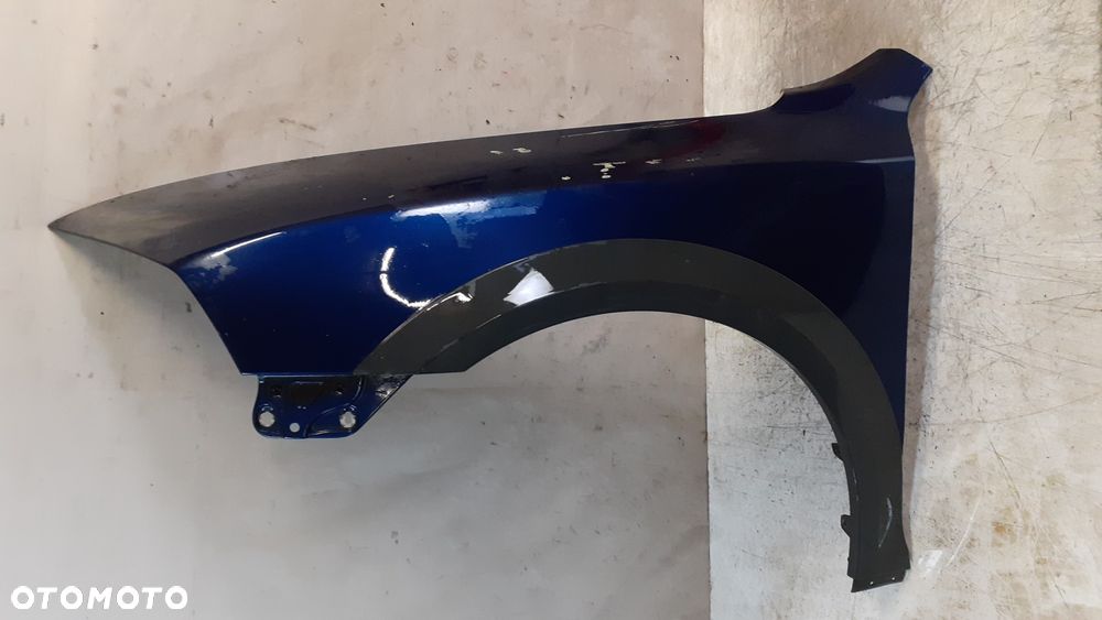 * SKODA OCTAVIA II 2 SCOUT BŁOTNIK PRZÓD PRZEDNI LEWY GRANATOWY - 1