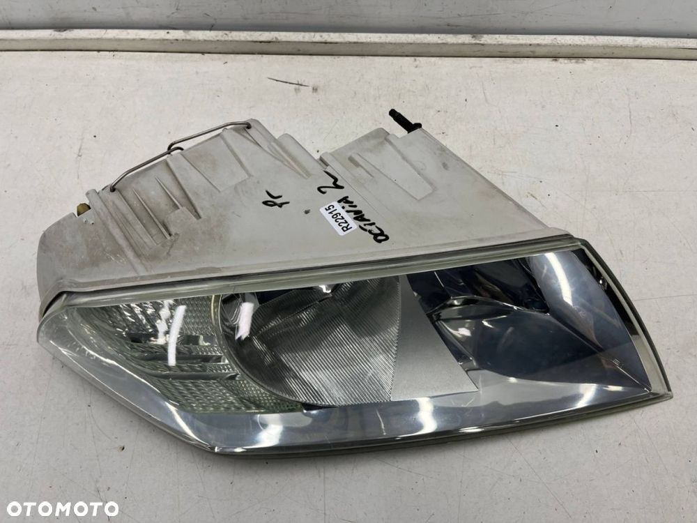 Lampa reflektor Skoda Octavia 2 II 04-08r. prawa przednia Europa zwykła H7 H1 oryginal - 8