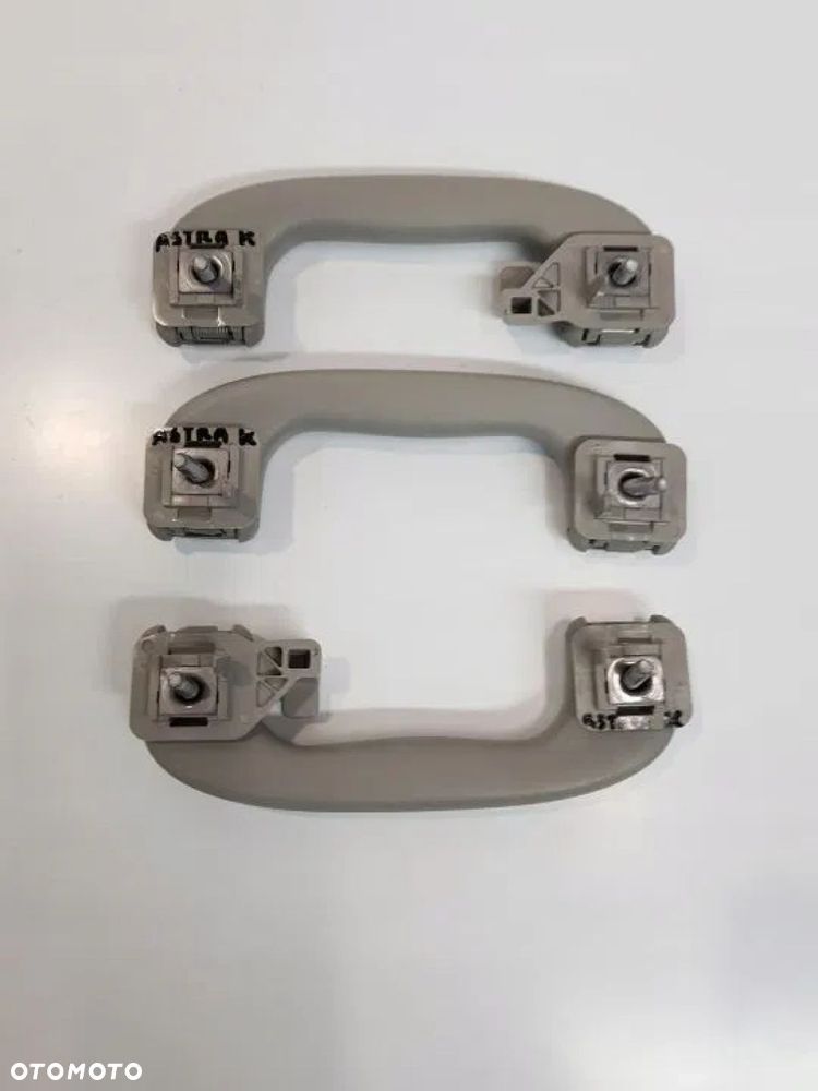 RĄCZKA UCHWYT PODSUFITKI TYŁ OPEL ASTRA K V - 2