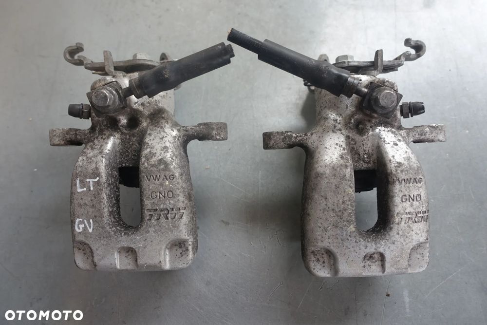 ZACISK LEWY PRAWY TYŁ LEON III OCTAVIA III TRW 12r.- - 1