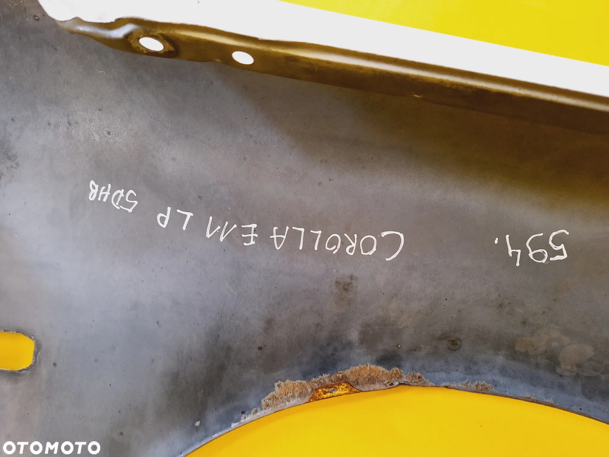 BŁOTNIK LEWY PRZÓD PRZEDNI TOYOTA COROLLA E11 NR594 - 21