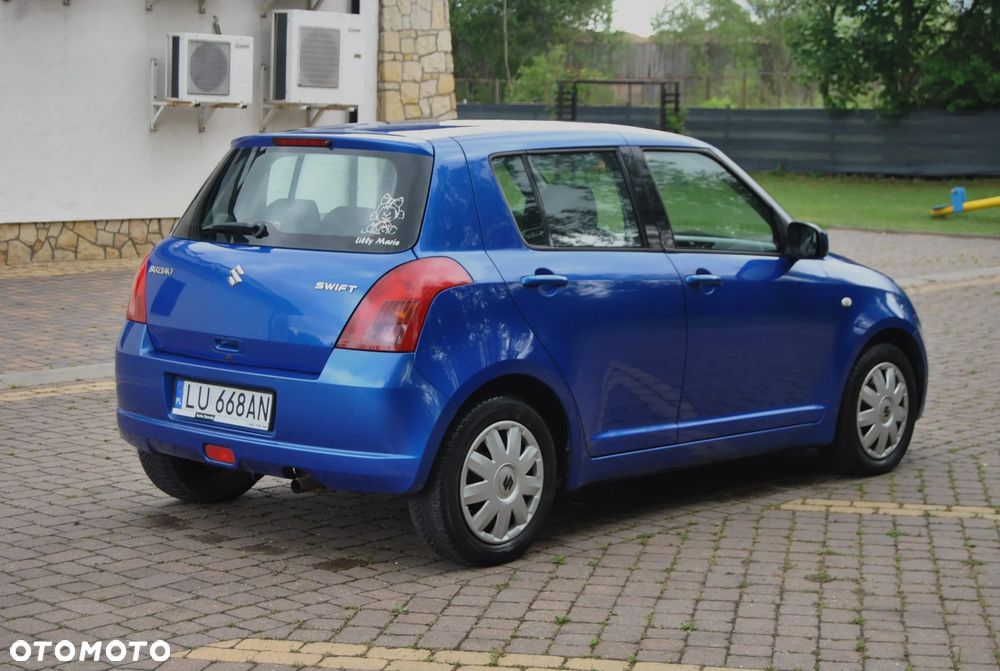 Suzuki Swift 1.3 Club - 3
