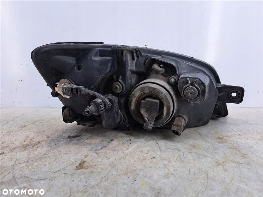 Reflektor lampa przód lewa Hyundai Getz  92101-1CXXX 2002-2005 - 4