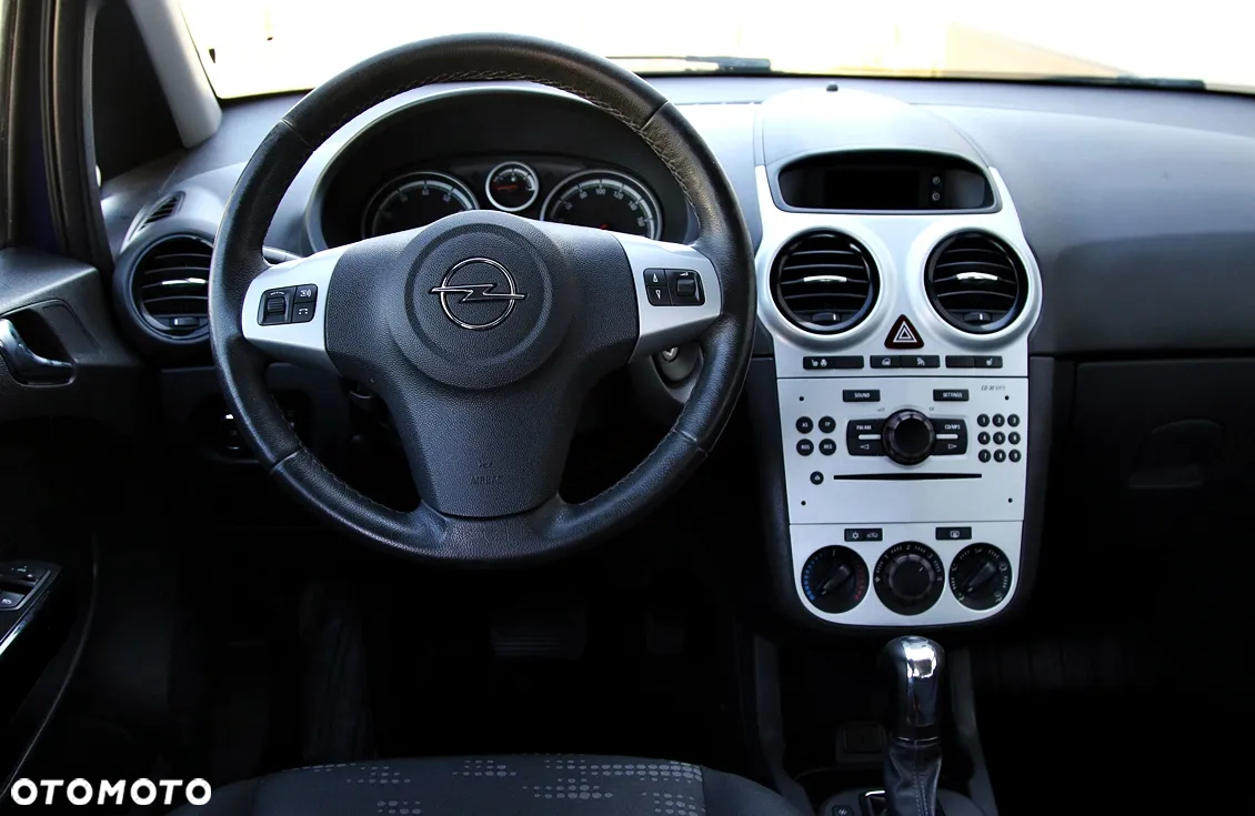 Opel Corsa 1.4 16V Enjoy - 24