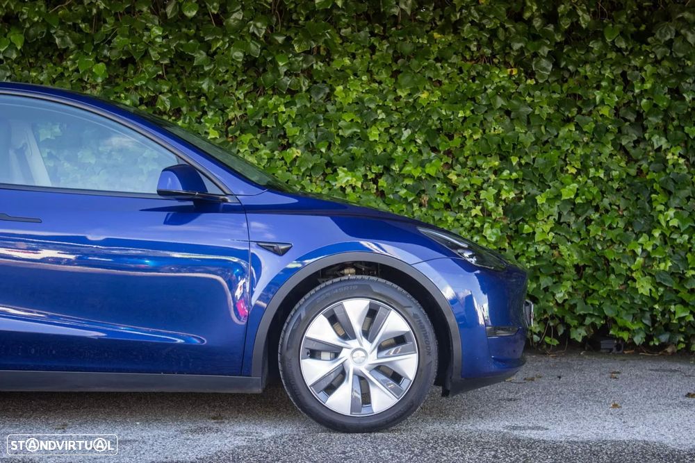 tesla model-y ver-long-range-tra-o-integral - 5