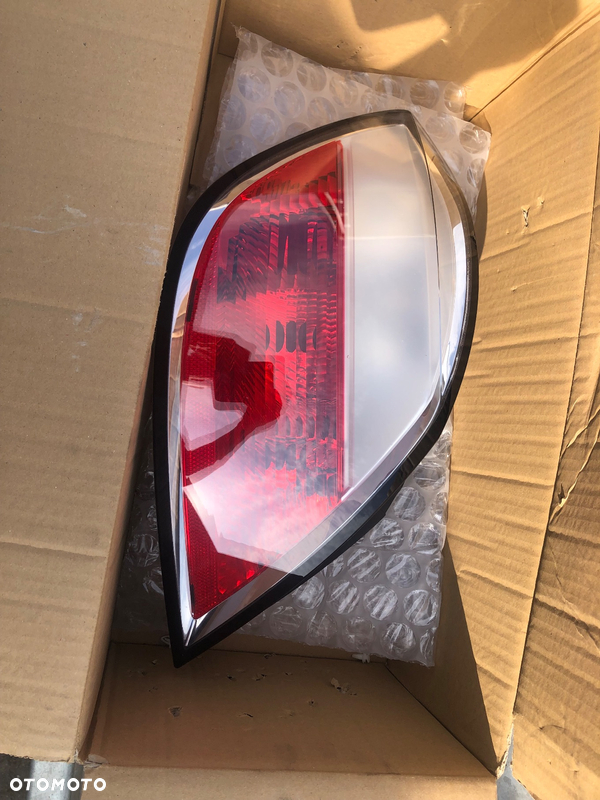 Lampa tył lewa Opel Astra H HB HELLA NOWA