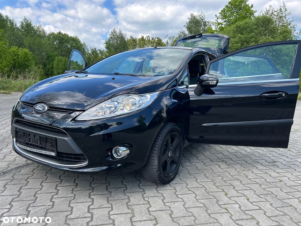 Ford Fiesta 1.4 Ghia - 23
