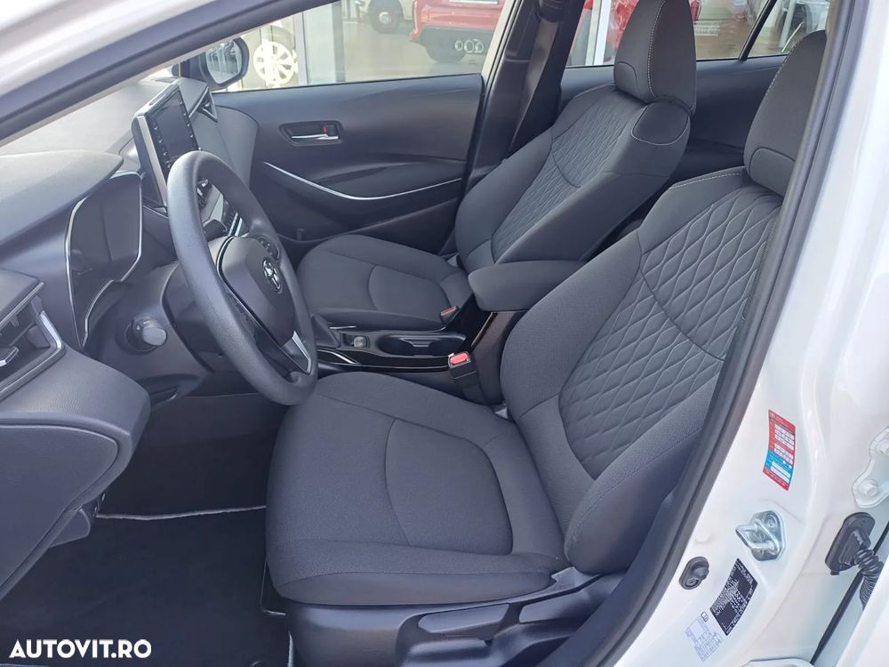 Toyota Corolla Sedan 1.8 HSD Business - 9
