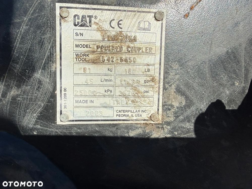 Caterpillar 310 - 21