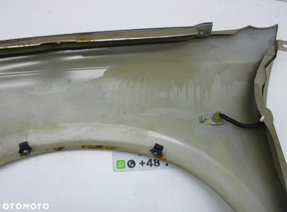 Nissan Almera  N16 Błotnik Prawy przód - 7