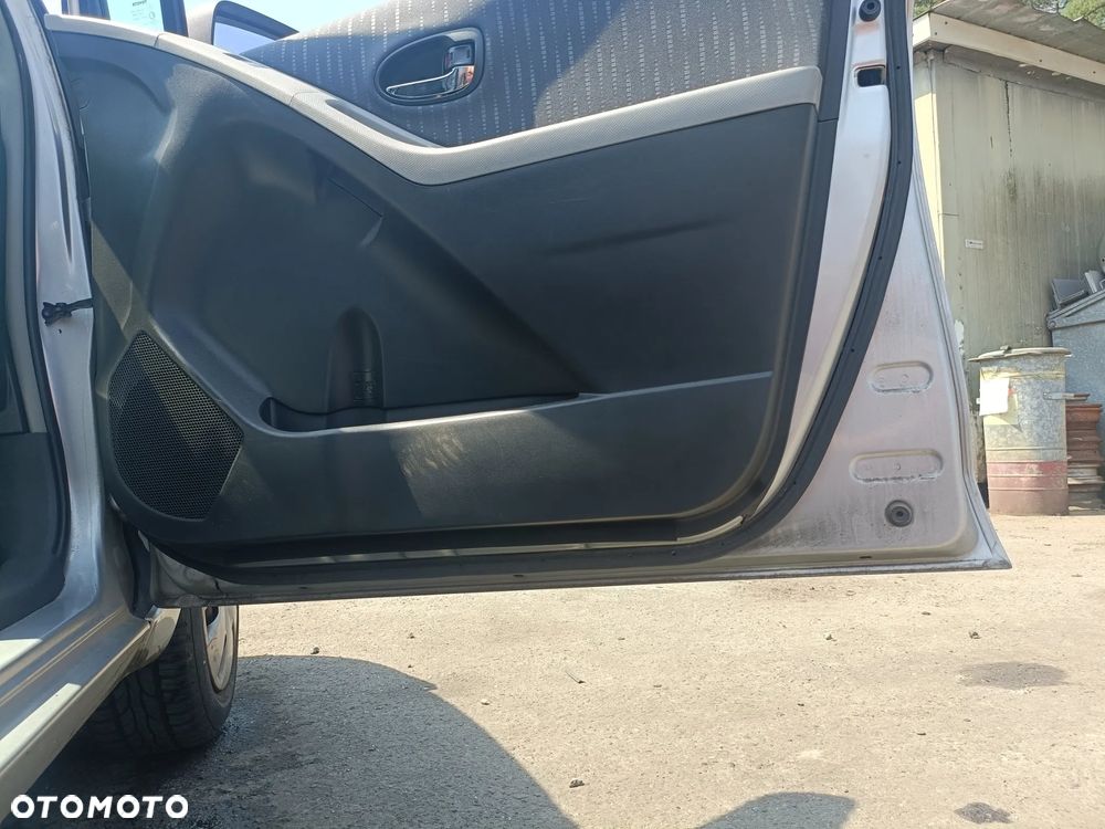 TOYOTA YARIS II 05-11 LIFT 2009 r. 1E7 5D HB drzwi prawy przód PP srebrne * - 11