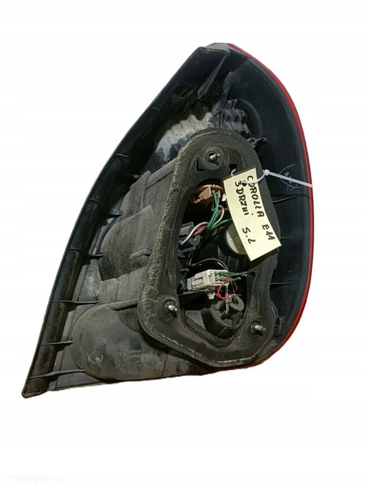 TOYOTA COROLLA E11 99-02 r. 3D LAMPA LEWY TYŁ LEWA TYLNA EU KOITO 12-439+ - 3