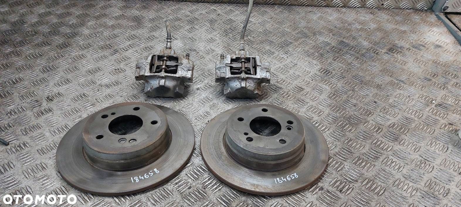 TARCZE HAMULCOWE TYŁ + ZACISKI MERCEDES W210 277MM - 1