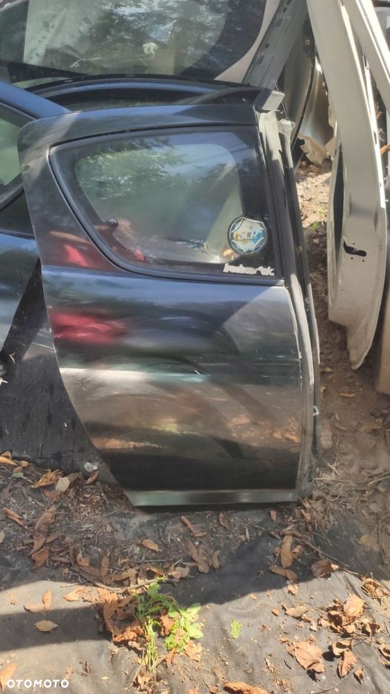 DRZWI PRAWY TYŁ MAZDA RX8 SZYBA CZARNE - 1