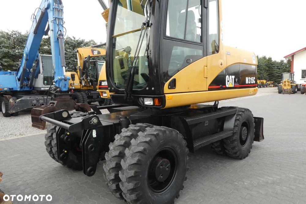 Caterpillar M315C Z NIEMIEC TRZY ŁYZKI - 12
