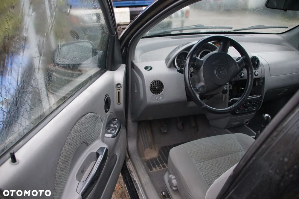 Auto na części - Daewoo Kalos 1.4 E-TEC II 94 KM F14D3 2005R Silnik Skrzynia Drzwi Maska Klapa Błotnik Zderzak Lampa Lusterko Klamka Deska Kokpit Sterownik Moduł Licznik Kierownica Panel - 7