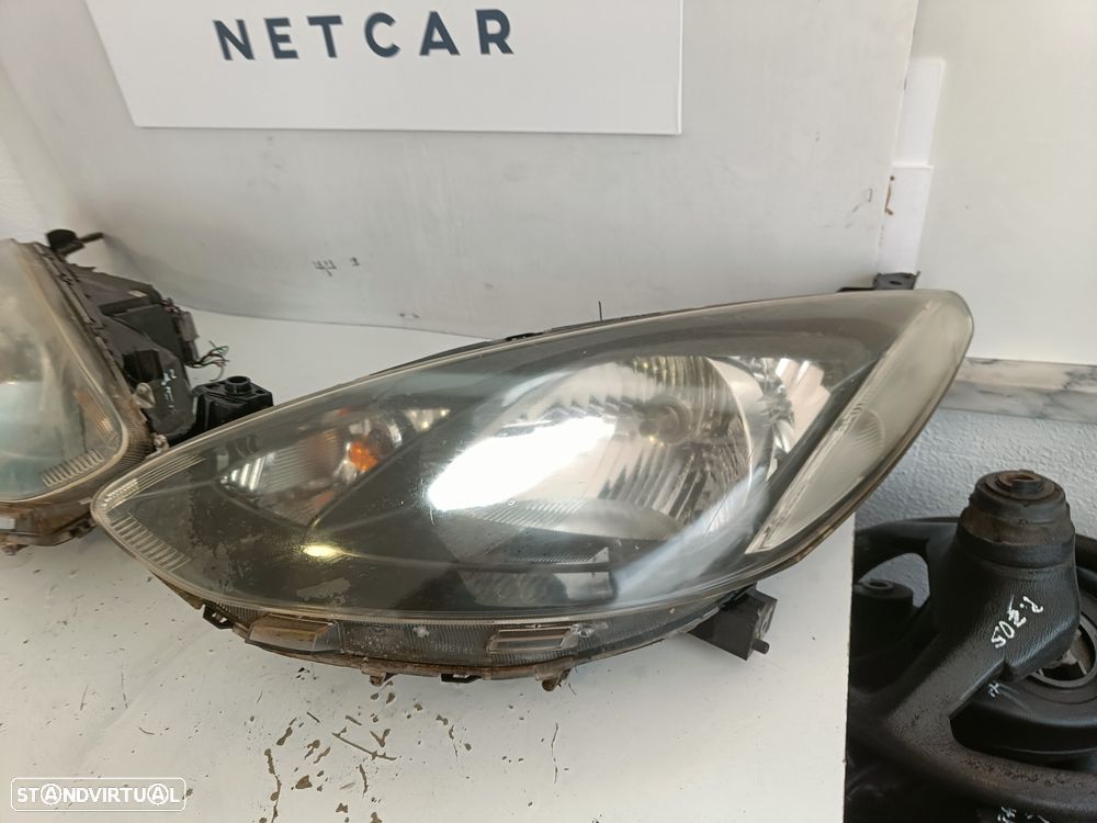 Farol optica Mazda 2 2009 - 2