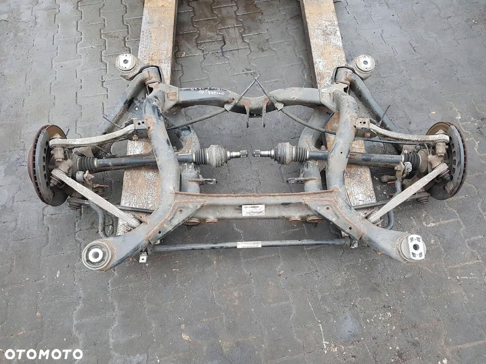 AUDI Q7 4L LIFT 09-15r 3.0 TDI BELKA ZAWIESZENIA TYŁ TYLNA 7L0500041