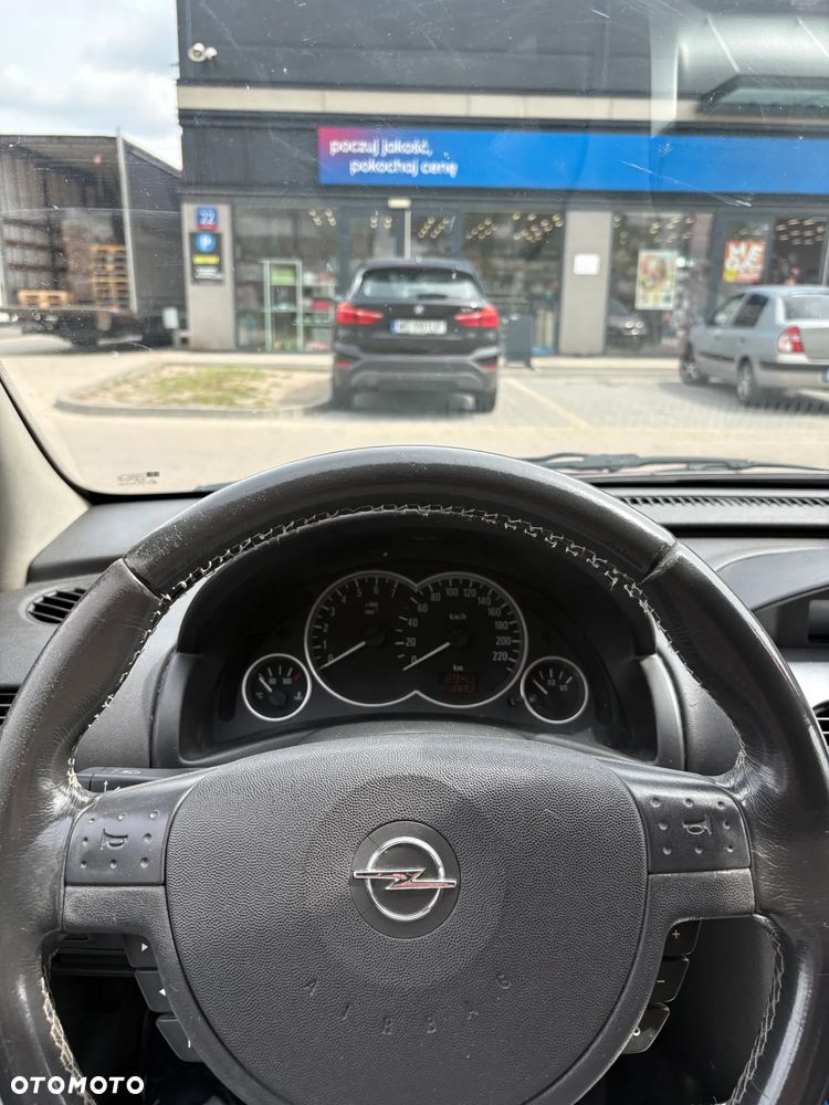 Opel Corsa 1.2 16V NJoy - 11